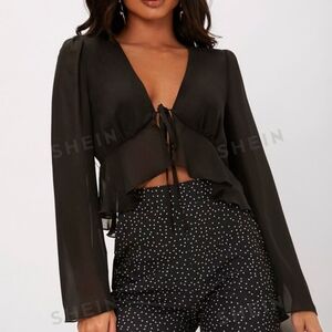 Black tie front ruffle hem top